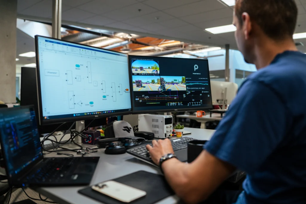 Engineer reviewing telematics software